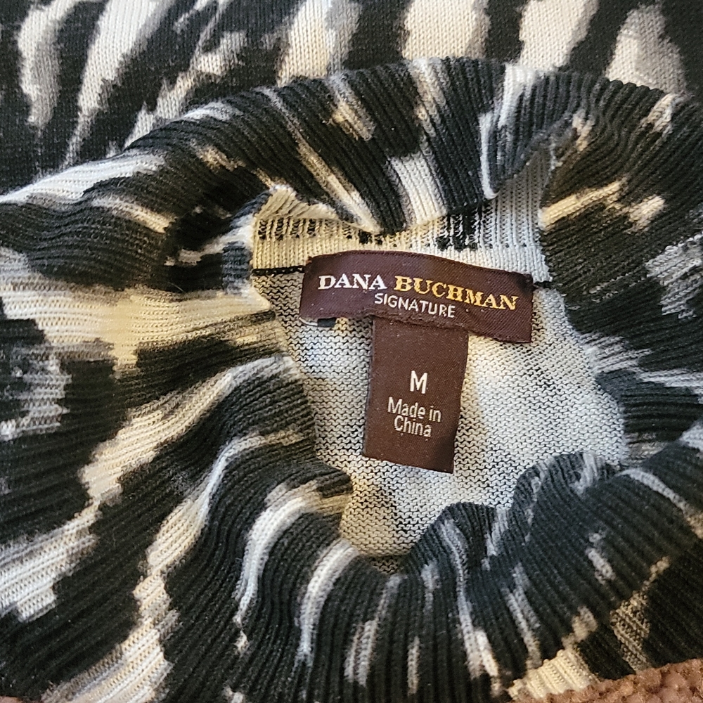 Sleeveless Sweater... Dana Buchman